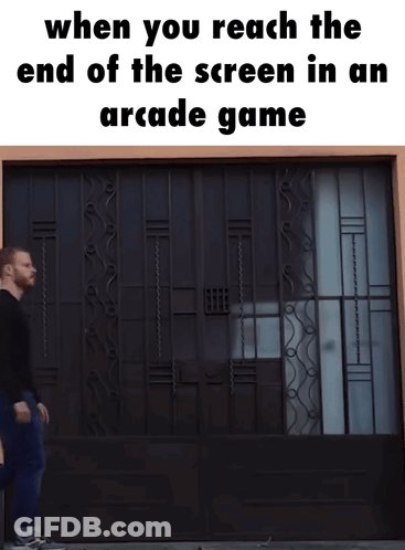 Man Walking Past Wrought Iron Gate End Of Screen GIF
