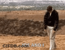 A Man Is Walking On A Beach With The Words Joe And I On The Bottom . GIF