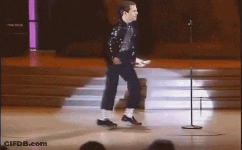 Man Walking On Stage With Microphone GIF