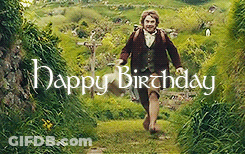 A Man Is Walking Through A Lush Green Field With The Words Happy Birthday Written In White Letters GIF