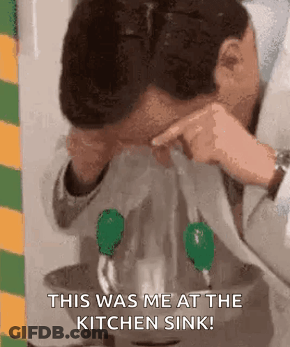 A Man Is Washing His Face In A Kitchen Sink And Says `` This Was Me At The Kitchen Sink! '' GIF