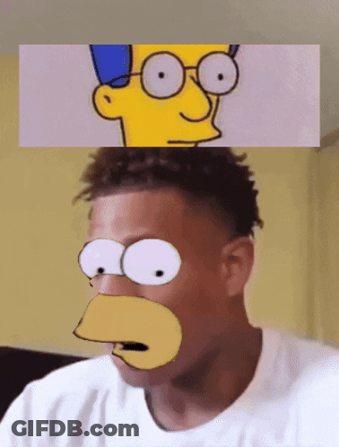 A Man Is Wearing A Bart Simpson Mask On His Face GIF