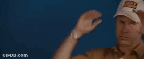 A Man Is Wearing A Baseball Cap And Adjusting His Glasses . GIF