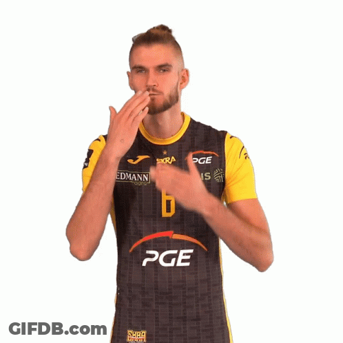 A Man Is Wearing A Black And Yellow Shirt With The Number 6 On It GIF