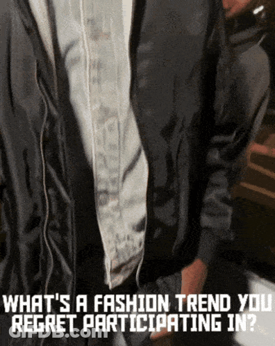 A Man Is Wearing A Black Jacket And A White Shirt With The Words What 'S A Fashion Trend You Regret Participating In Bel GIF