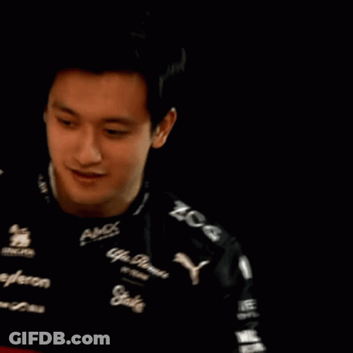 A Man Is Wearing A Black Shirt That Says Amx On It GIF