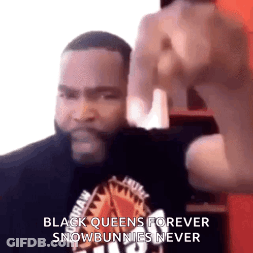 A Man Is Wearing A Black Shirt That Says Raw GIF