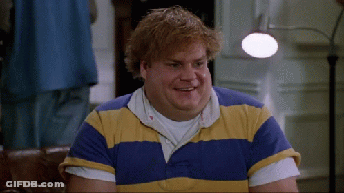 A Man Is Wearing A Blue And Yellow Striped Shirt GIF