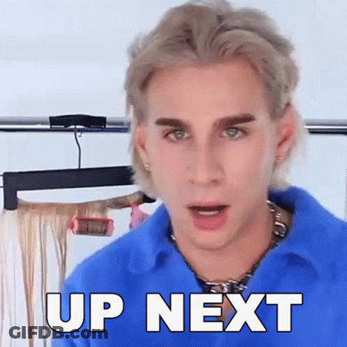 A Man Is Wearing A Blue Shirt And Says Up Next GIF