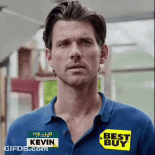 A Man Is Wearing A Blue Shirt With A Best Buy Sticker On It GIF