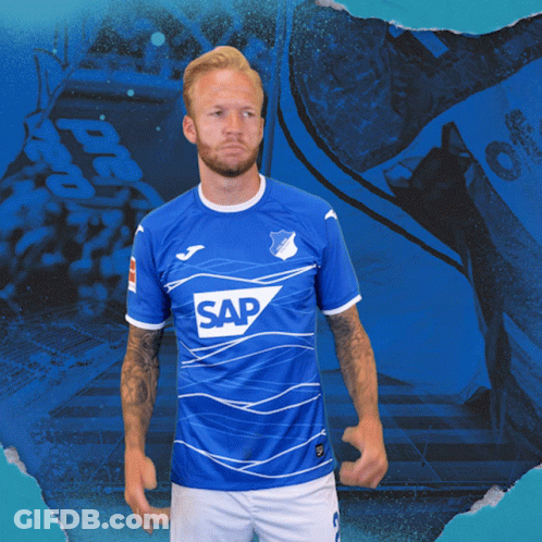 A Man Is Wearing A Blue Shirt With The Word Sap On It GIF