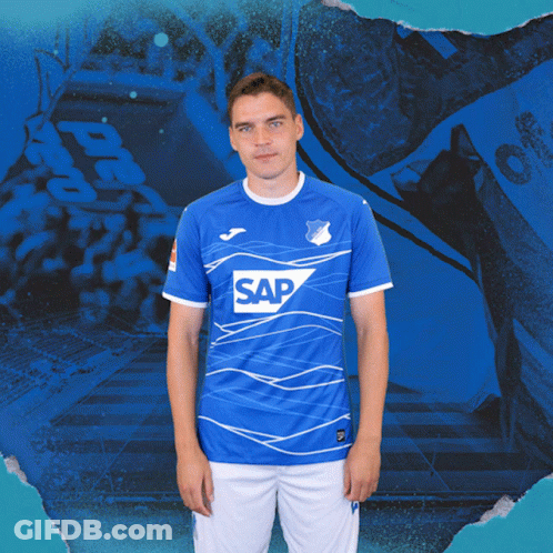 A Man Is Wearing A Blue Shirt With The Word Sap On It GIF