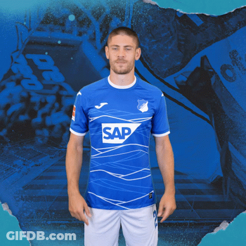 A Man Is Wearing A Blue Shirt With The Word Sap On It GIF