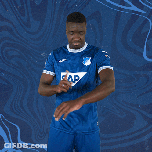 A Man Is Wearing A Blue Shirt With The Word Sap On It GIF