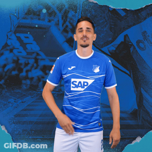 A Man Is Wearing A Blue Shirt With The Word Sap On It GIF