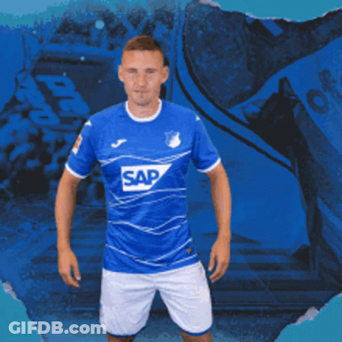A Man Is Wearing A Blue Shirt With The Word Sap On It GIF