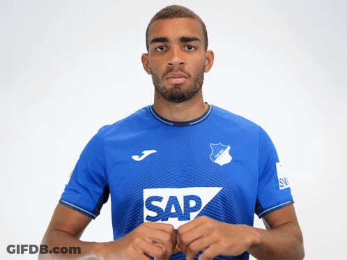 A Man Is Wearing A Blue Shirt With The Word Sap On It GIF