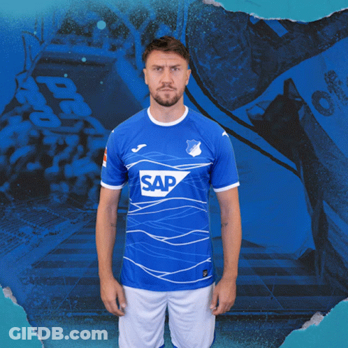 A Man Is Wearing A Blue Shirt With The Word Sap On It GIF