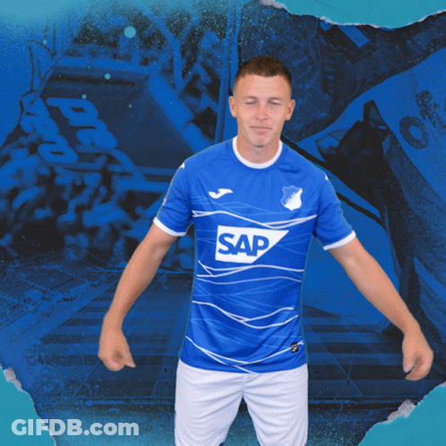 A Man Is Wearing A Blue Shirt With The Word Sap On It GIF