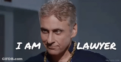 A Man Is Wearing A Chain Around His Neck And Says I Am Lawyer GIF