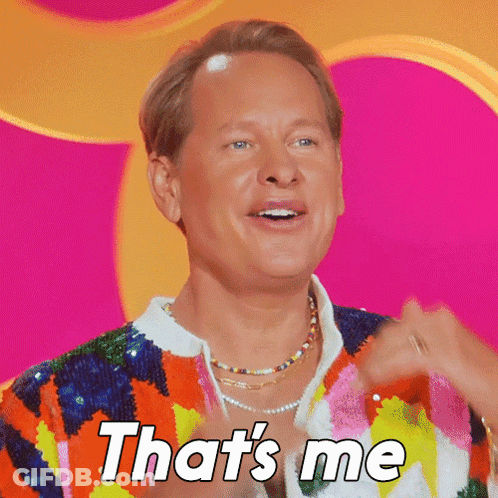A Man Is Wearing A Colorful Sweater And Necklace And Says That 'S Me GIF