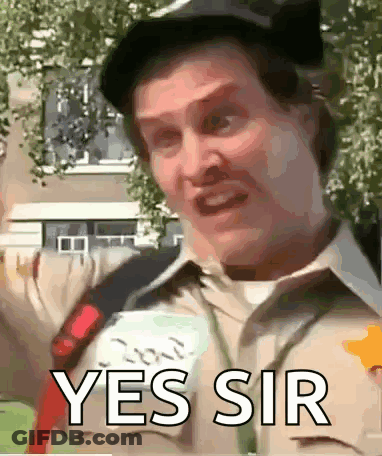A Man Is Wearing A Hat And A Shirt That Says Yes Sir . GIF