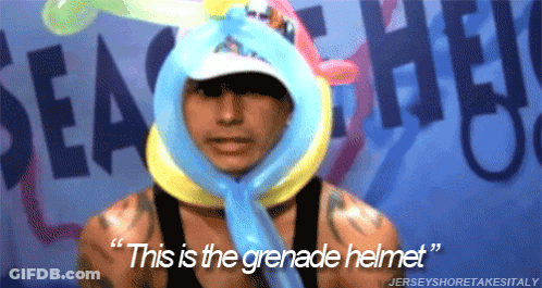 A Man Is Wearing A Helmet Made Of Balloons And Says " This Is The Grenade Helmet " GIF