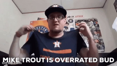 A Man Is Wearing A Houston Astros Shirt And A Hat And Says Mike Trout Is Overrated Bud GIF