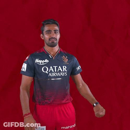 A Man Is Wearing A Qatar Airways Shirt GIF