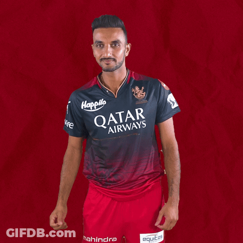A Man Is Wearing A Qatar Airways Shirt GIF