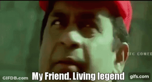 A Man Is Wearing A Red Hat And Says " My Friend Living Legend " GIF
