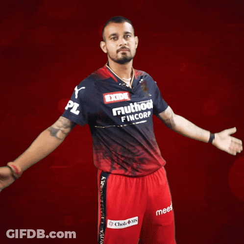 A Man Is Wearing A Shirt That Says Exide On It GIF