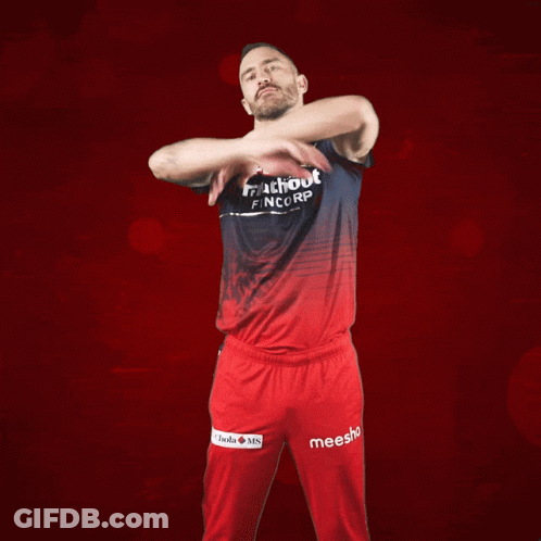 A Man Is Wearing A Shirt That Says Matchboot Fincorp On It GIF