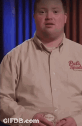 A Man Is Wearing A Shirt That Says Pats Spades On It GIF