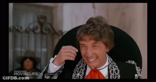A Man Is Wearing A Sombrero And Smiling In A Movie Clip GIF