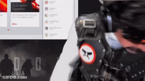 A Man Is Wearing A Star Wars Squadrons Vest GIF