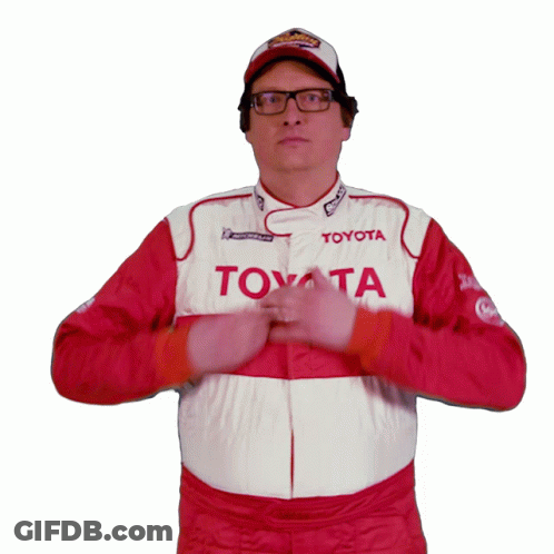 A Man Is Wearing A Toyota Racing Suit GIF