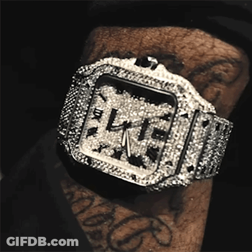Man Wearing Diamond Watch Showing 1:45 GIF