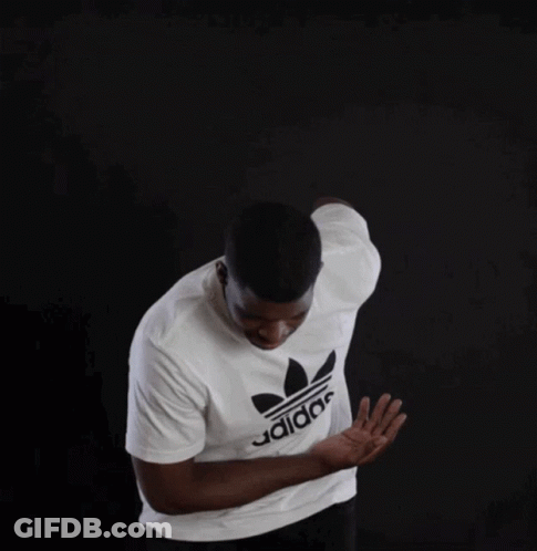 A Man Is Wearing A White Adidas Shirt GIF