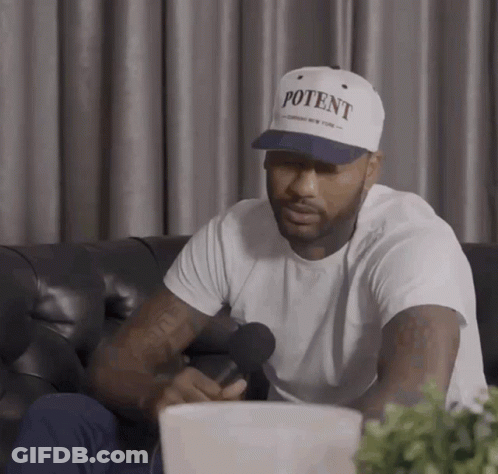 A Man Is Wearing A White Hat That Says Potent GIF