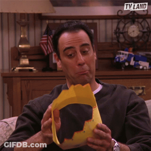 A Man Is Wearing A Yellow Crown And The TV Land Logo Is Visible GIF