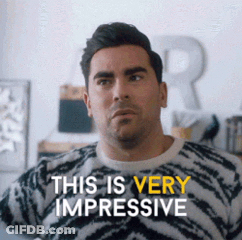 A Man Is Wearing A Zebra Print Sweater And Says This Is Very Impressive GIF
