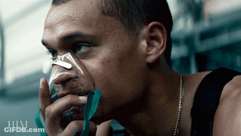 A Man Is Wearing An Oxygen Mask And The Word Him Is On The Bottom GIF