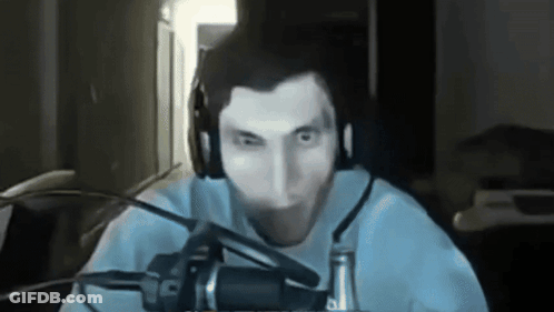 A Man Is Wearing Headphones And A Microphone GIF