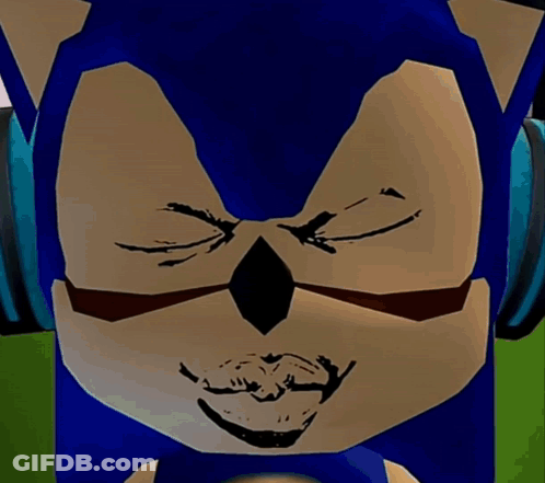 A Man Is Wearing Headphones And Making A Funny Face . GIF