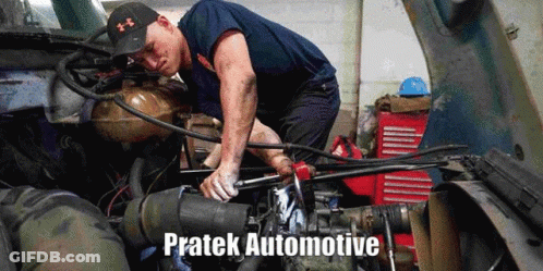 A Man Is Working On The Engine Of A Truck With The Words Pratek Automotive Written Below Him GIF