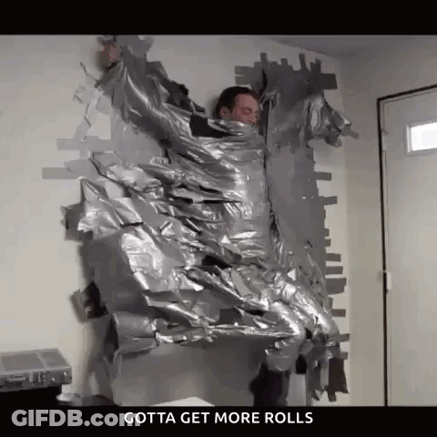 A Man Is Wrapped In Duct Tape And Says Gotta Get More Rolls On The Bottom . GIF