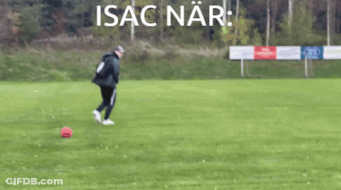 A Man Kicking A Soccer Ball On A Field With The Word Isaac Nar Written Above Him GIF