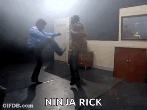 A Man Kicking Another Man In The Face With The Words Ninja Rick Written Below Him GIF