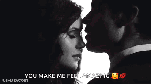 A Man Kissing A Woman On The Forehead With The Words You Make Me Feel Amazing Below Them GIF